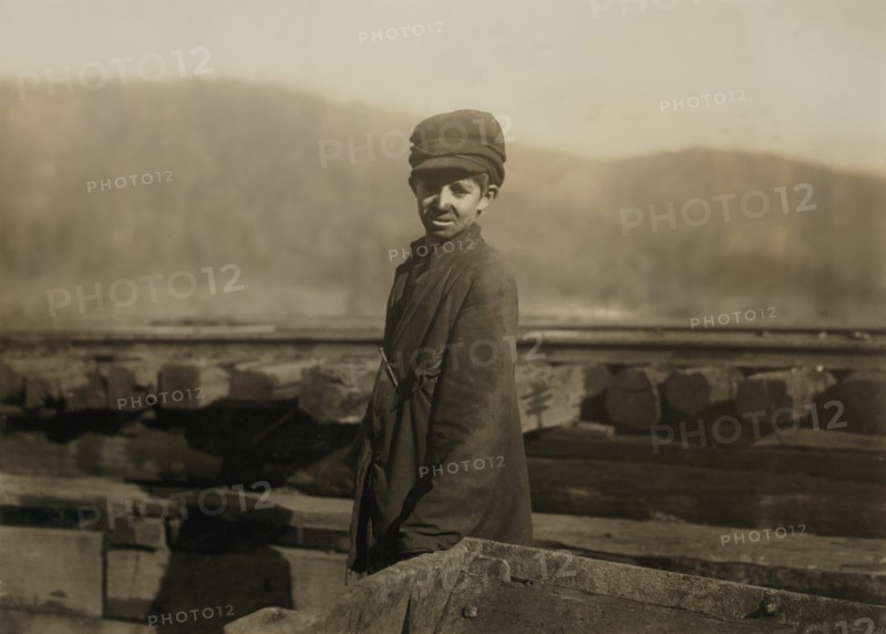 Harley Bruce, Young Coupling Boy at Tippling of Indian Mountain Mine, Proctor Coal Company, Three-Quarter Length Portrait, near Jellico, Tennessee, USA, Lewis Hine for National Child Labor Committee, December 1910
