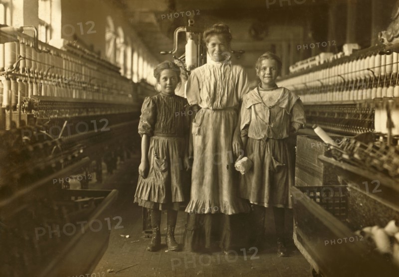Three Young Workers, Girl on Left said she was 10 years old, girl on Right said she was 12, Rhodes Manufacturing Company, Lincolnton, North Carolina, USA, Lewis Hine for National Child Labor Committee, November 1908