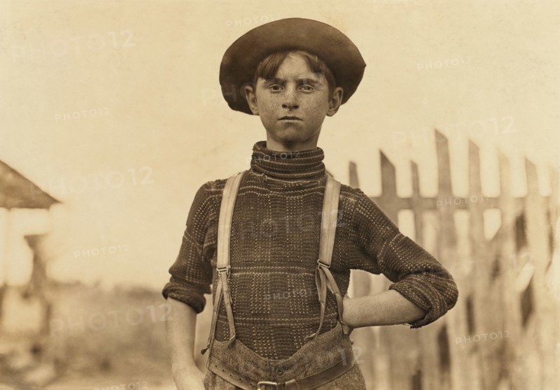 John Lewis, 12 years old, Weaver in Cotton Mill, Half-Length Portrait, Chester, South Carolina, USA, Lewis Hine for National Child Labor Committee, November 1908