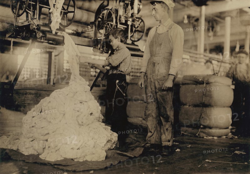 Young Boy on Warping Machine, Elk Cotton Mills, Fayetteville, Tennessee, USA, Lewis Hine for National Child Labor Committee, November 1910