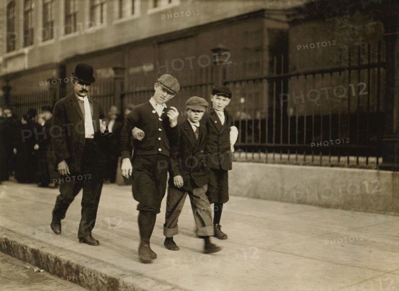 Three Young Boys Heading to the Ayer Textile Mill, 6:30 to 7:00 a.m., Lawrence, Massachusetts, USA, Lewis Hine for National Child Labor Committee, September 1911