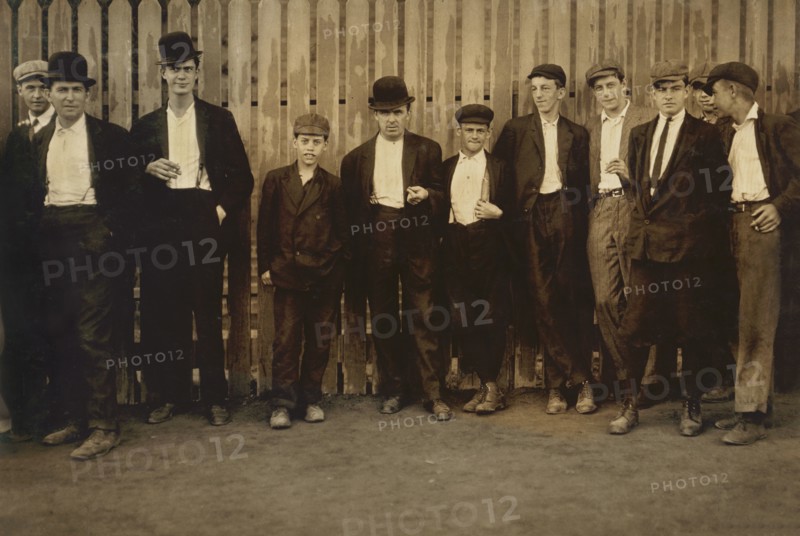 Portrait of Male Workers Heading to the Ayer Textile Mill, 6:30 to 7:00 a.m., Lawrence, Massachusetts, USA, Lewis Hine for National Child Labor Committee, September 1911