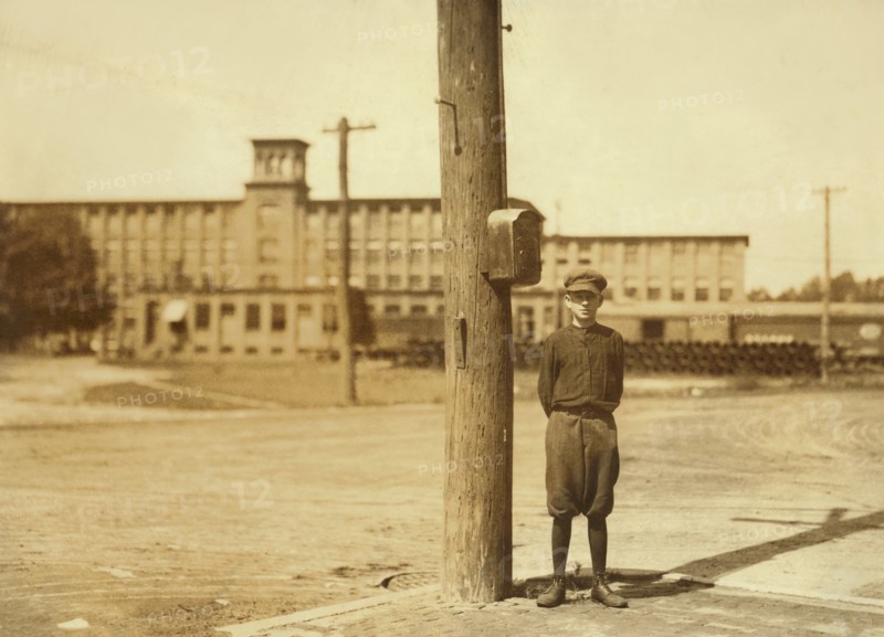 Clarence Noel, Full-Length Portrait, Works as Doffer at Hodges Fibre Carpet Company, Indian Orchard, Massachusetts, USA, Lewis Hine for National Child Labor Committee, September 1911