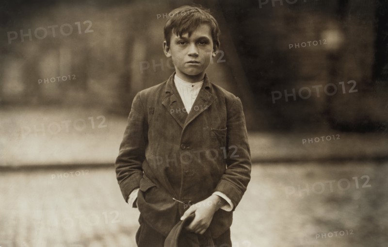 Joseph Philip, Pin Boy at Les Miserables Bowling Alley, Said he was 11 years old, Worked until Midnight every Night, Half-Length Portrait, Lowell, Massachusetts, USA, Lewis Hine for National Child Labor Committee, October 1911