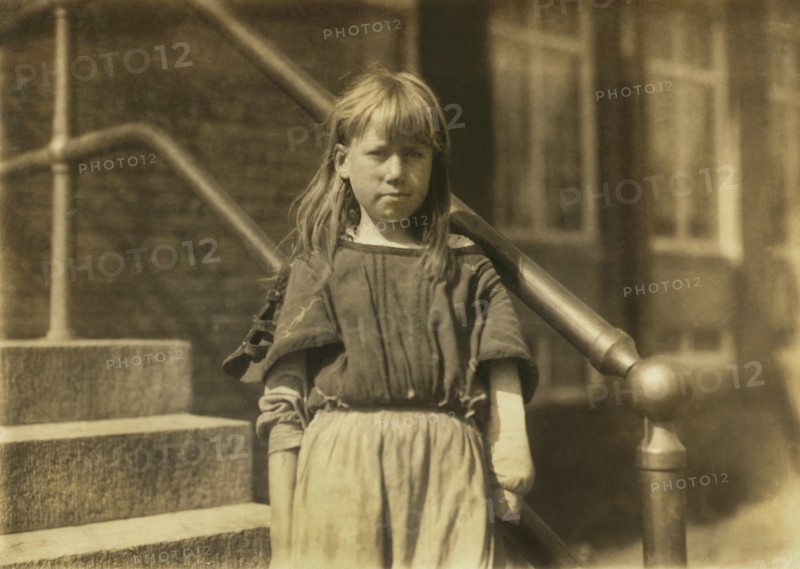 Pearl, 10 years old, Half-Length Portrait, Helps her Mother in Weave Room at Pickett Cotton Mill, High Point, North Carolina, USA, Lewis Hine for National Child Labor Committee, October 1912