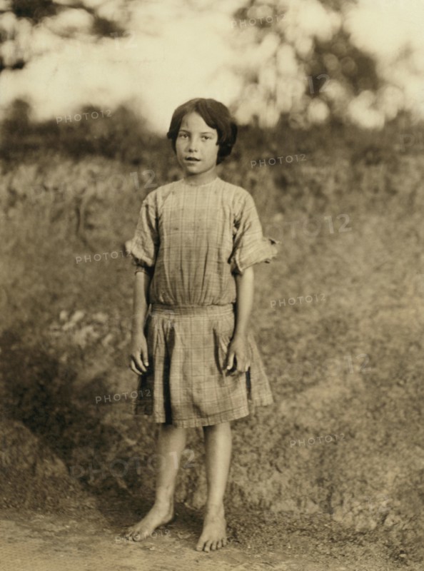 Ruth Rous, said she was 11 years old, but others said she is not yet 10, Full-length Portrait, Works at Deep River Cotton Mills, Randleman, North Carolina, USA, Lewis Hine for National Child Labor Committee, May 1913