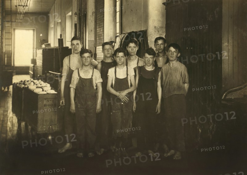 Group of Back Boys in Mule Room, 14 to 16 years old, Full-Length Portrait, King Philip Mills, Fall River, Massachusetts, USA, Lewis Hine for National Child Labor Committee, June 1916