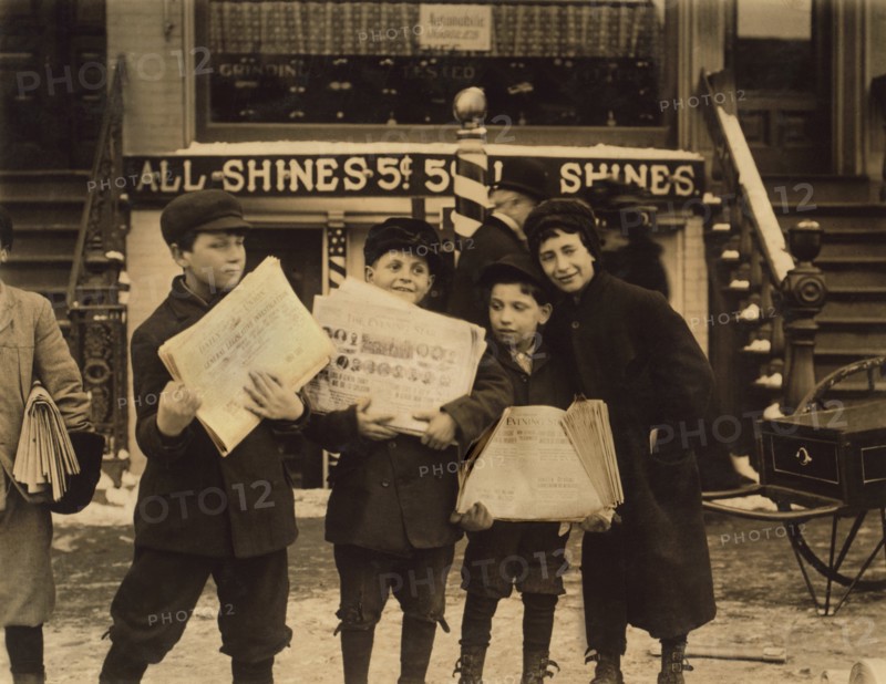 Four Newsboys Selling Newspapers after School, Schenectady, New York, USA, Lewis Hine for National Child Labor Committee, February 1910
