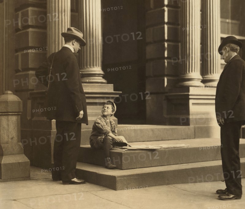 Harry Silverstein, 7-year-old Newsboy, Selling Newspapers on Building's Steps, Works 8 hours per day, Visits Saloons, Wilmington, Delaware, USA, Lewis Hine for National Child Labor Committee, May 1910