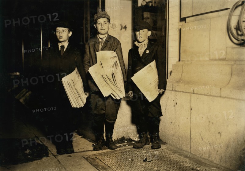 Lawrence Lee, 10 years old, Michael Nyland, 11 years old, Martin Garvin, 12 years old, Full-Length Portrait Selling Newspapers near 14th after Midnight, All vowing to stay until all newspapers were sold, Washington DC, USA, Lewis Hine for National Child Labor Committee, April 1912