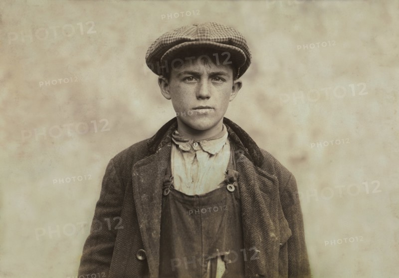 James Donovan, Sweeper at Fall River Iron Works, Half-Length Portrait, Fall River, Massachusetts, USA, Lewis Hine for National Child Labor Committee, June 1916
