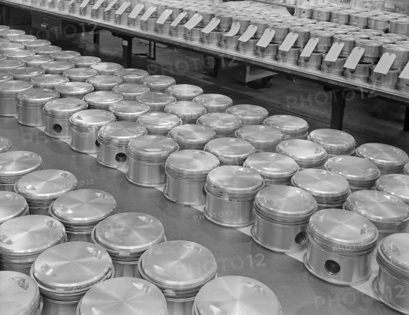 Airplane Engine Pistons, Complete with Rings, are Lined up for Assembly at Manufacturing Plant, Pratt & Whitney, East Hartford, Connecticut, USA, Andreas Feininger for Office of War Information, June 1942