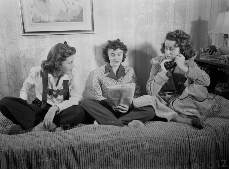 Three Government Workers Showing how to Dress to Stay Warm as Homes will be Kept at 65 Degrees during Winter due Federal Fuel Oil Limitation Orders, Washington DC, USA, Albert Freeman for Office of War Information, October 1942
