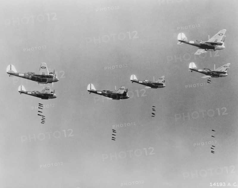 600-pound Bombs falling from Formation of B-10 Bombers in Bombing Practice by 19th Bombardment Group, U.S. Army Air Corps, Office of War Information, early 1940's