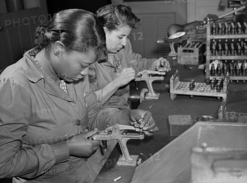 Two Female Factory Workers Reconditioning used Spark Plugs to be re-used in Testing Military Aircraft Motors at Buick Plant Converted for War Product Production, Melrose Park, Illinois, USA, Ann Rosener, Office of War Information, July 1942