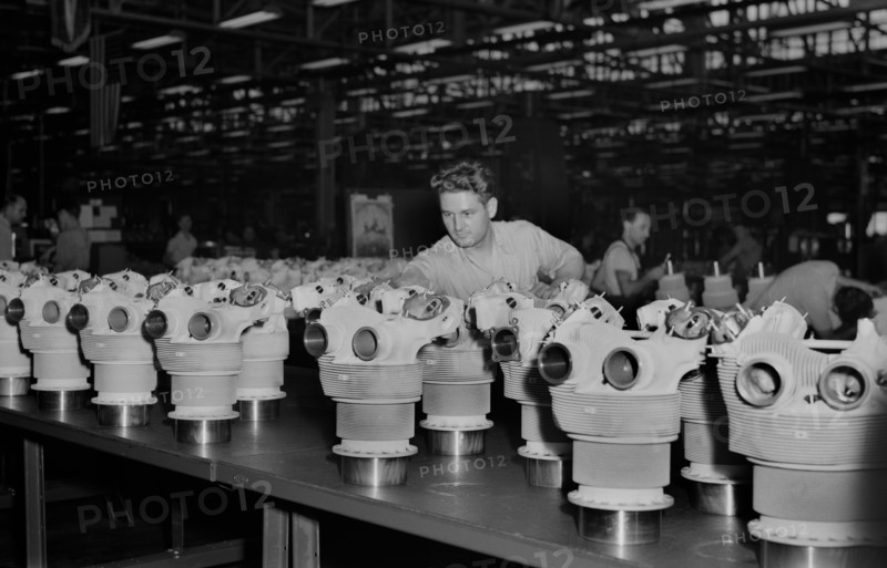 Cylinder Barrels Lined up for Inspection at Buick Plant Converted for War Product Production, Melrose Park, Illinois, USA, Ann Rosener, Office of War Information, July 1942