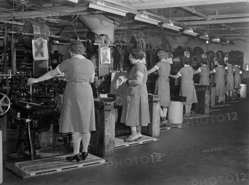 Row of Female Factory Workers Operating Machinery at Drill and Tool Plant that Manufactures Drills for use in all War Production Industries, Republic Drill and Tool Company, Chicago, Illinois, USA, Ann Rosener, Office of War Information, August 1942