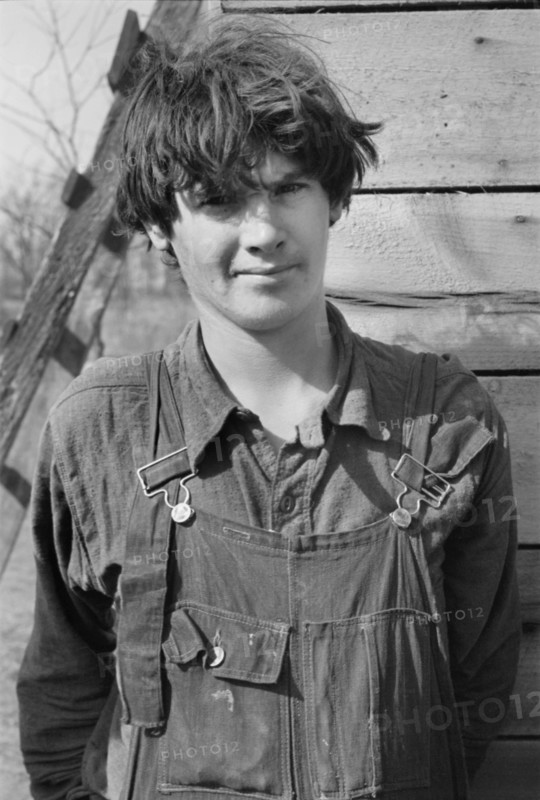Oldest Boy of Family of Nine, Seventeen Years Old, Claims Two Years Schooling, Living with his Family in Open Field, on U.S. Route 70 between Camden and Bruceton, Tennessee, USA, Carl Mydans for U.S. Resettlement Administration, March 1936