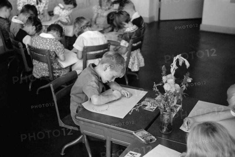 High Angle View of Children at Work in Classroom, Greenhills, Ohio, USA, a Greenbelt Community Constructed by U.S. Department of Agriculture as Part of President Franklin Roosevelt's New Deal, John Vachon for U.S. Resettlement Administration, October 1938