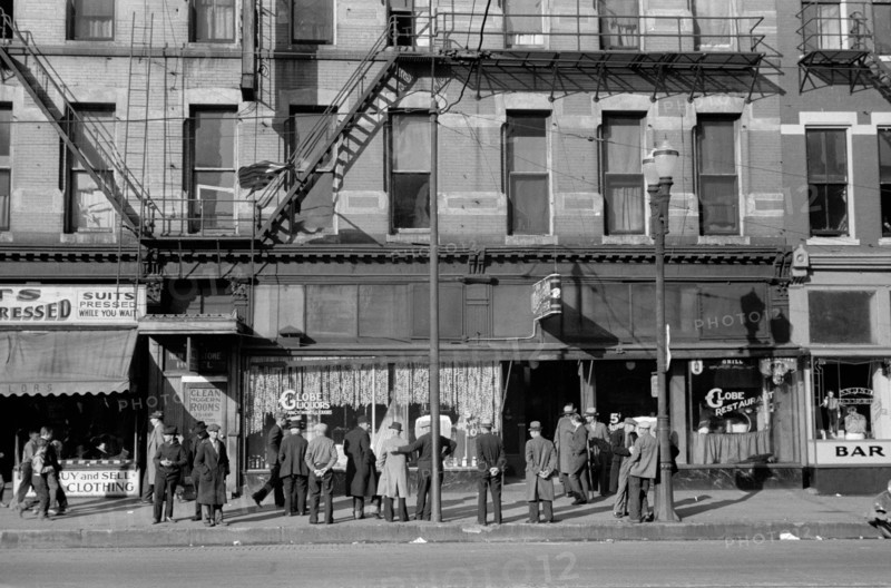 Group of Unemployed Men Hanging out on Lower Douglas Street, Omaha, Nebraska, USA, John Vachon for Farm Security Administration, November 1938