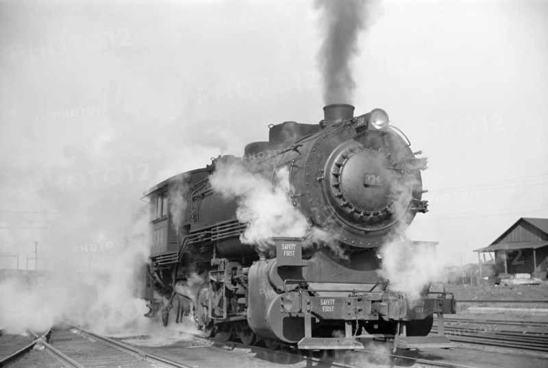 Locomotive in Railway Yard along River, St. Louis, Missouri, USA, Arthur Rothstein for Farm Security Administration, January 1939