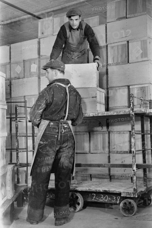 Two Workers Storing Crates of Eggs in Cold Storage Warehouse, Jersey City, New Jersey, USA, Arthur Rothstein for Farm Security Administration, January 1939