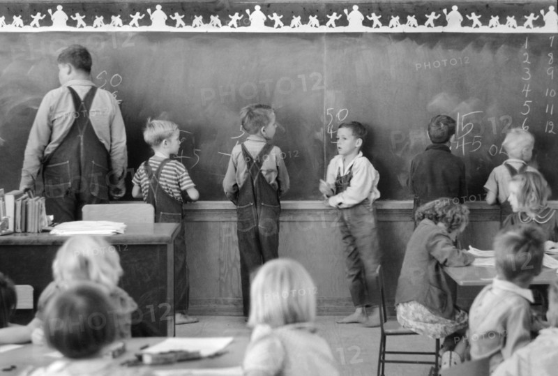 Children of Migratory Workers in Elementary School Classroom at FSA Camp, Weslaco, Texas, USA, Arthur Rothstein for Farm Security Administration, February 1942