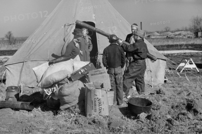 Family of Flood Refugees and their Salvaged Goods in Camp, Forrest City, Arkansas, USA, Edwin Locke for U.S. Resettlement Administration, February 1937