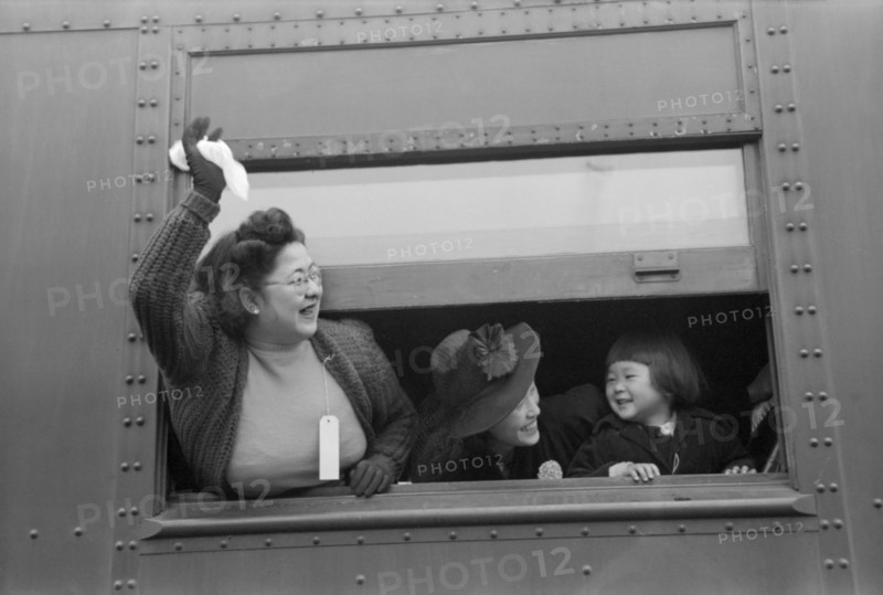 Japanese-Americans on Train to Owens Valley During Evacuation of Japanese-Americans from West Coast Areas under U.S. Army War Emergency Order, Los Angeles, California, USA, Russell Lee, Office of War Information, April 1942