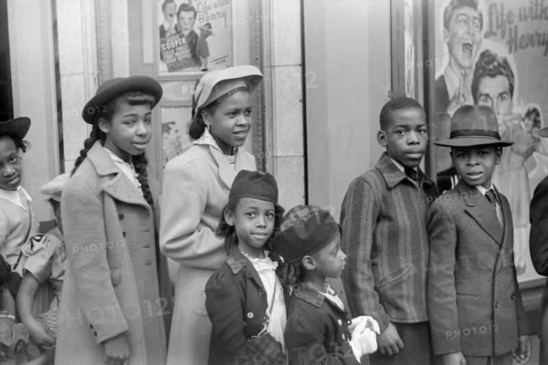 Children in Front of Moving Picture Theater, Easter Sunday Matinee, "Black Belt", Chicago, Illinois, USA, Edwin Rosskam for Office of War Information, April 1941