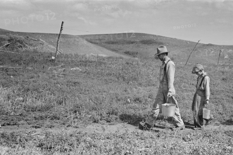 William Huravitch and Son Carrying Water to their Home during Drought, Water Source is about a Half Mile Away, Williams County, North Dakota, USA, Russell Lee, U.S. Resettlement Administration, September 1937