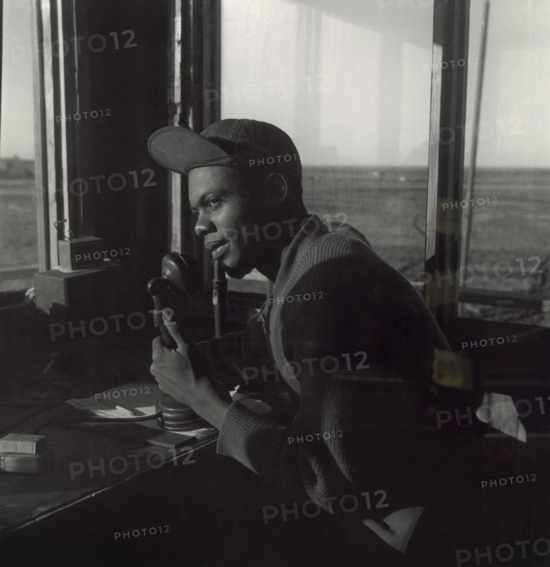 Sgt. William P. Bostic, 301st F.S. in Air Base Control Tower, Ramitelli, Italy, Toni Frissell, March 1945