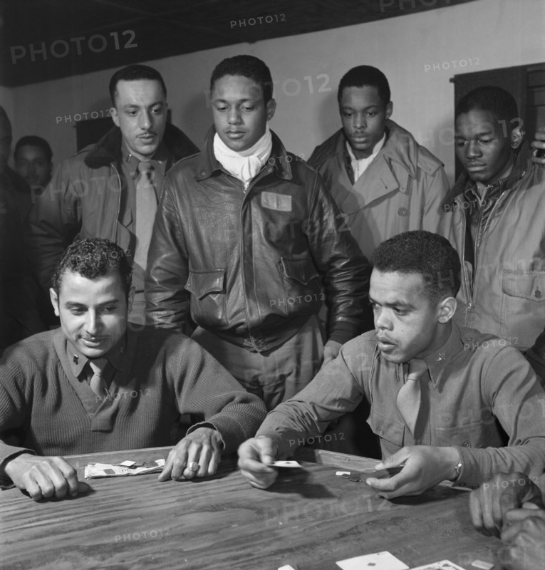 Tuskegee Airmen Playing Cards in Officers' Club, Seated, left to right: Robert Spurlock, Washington, DC; Harold M. Morris, Seattle, WA, Class 44-D