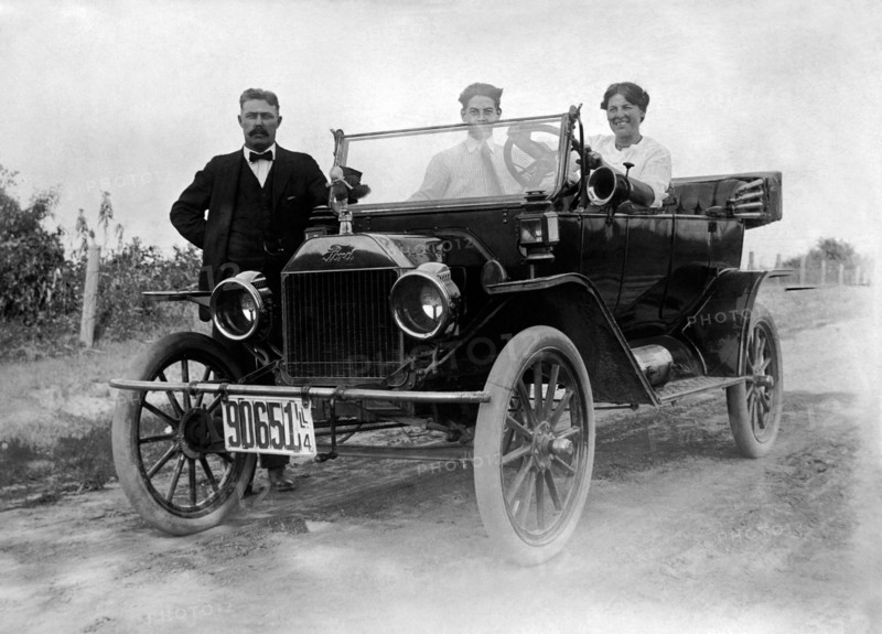 Two Men and a Woman with a Ford Model T Automobile, circa 1914
