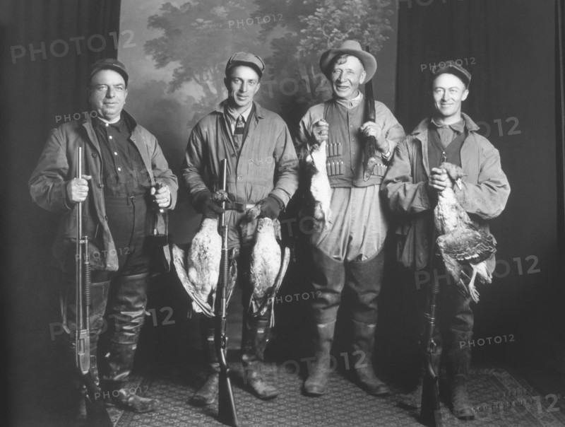 Four Hunters Holding Ducks and a Rabbit, Scottsbluff, Nebraska, USA