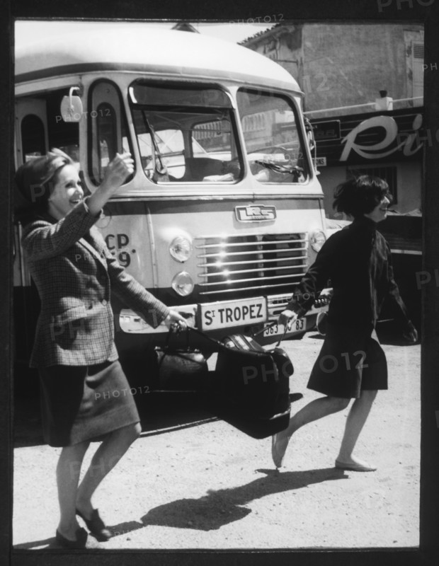 Women Crossing Street Carrying Suitcase, St. Tropez, France, 1965