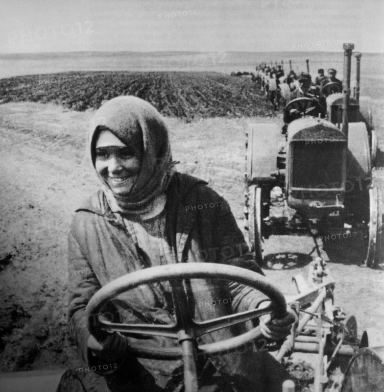 Woman Driving Tractor on Collective Farm, Soviet Union, 1928