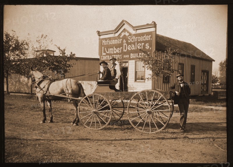 Horse and Buggy and Men in Front of a Lumber Store, 1900