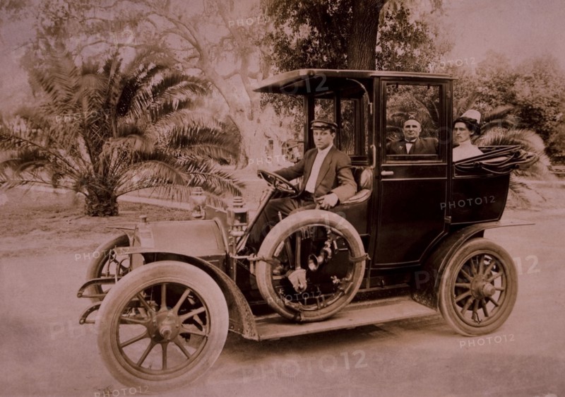 Couple and Driver in Automobile, USA, circa 1908