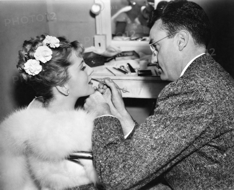 Joan Fontaine and Makeup Man on-set of the Film, "Blond Cheat", 1938
