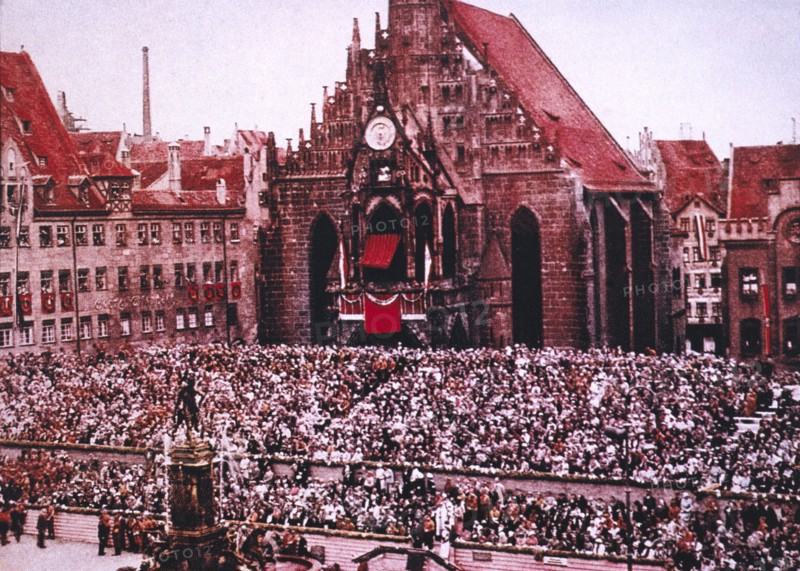 Crowd of Spectators Seated in front of Frauenkirche during Nazi Rally, Nuremberg, Germany, 1933