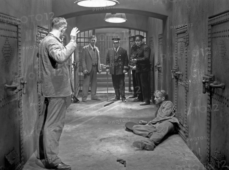 Boris Karloff, Walter Huston, De Witt Jennings and Phillips Holmes, on-set of the Film, "The Criminal Code", 1931