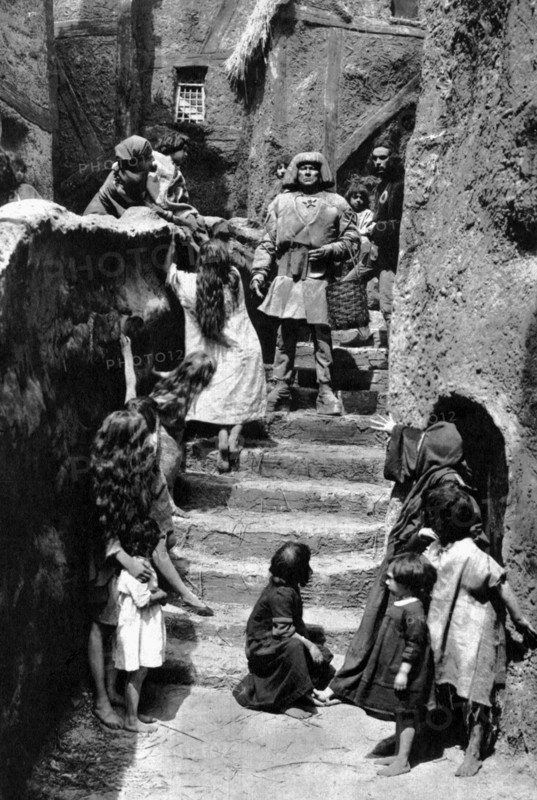Paul Wegener (center), on-set of the Silent Film, "The Golem: How He Came Into The World", 1920