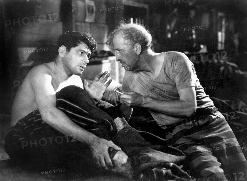 Paul Muni and Edward Ellis, on-set of the Film, "I am a Fugitive from a Chain Gang" directed by Mervyn LeRoy, 1932