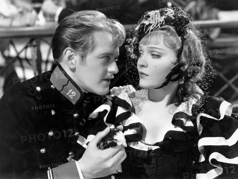 Hardie Albright and Anna Sten, on-set of the Film, "Nana" directed by Dorothy Arzner and George Fitzmaurice, 1934