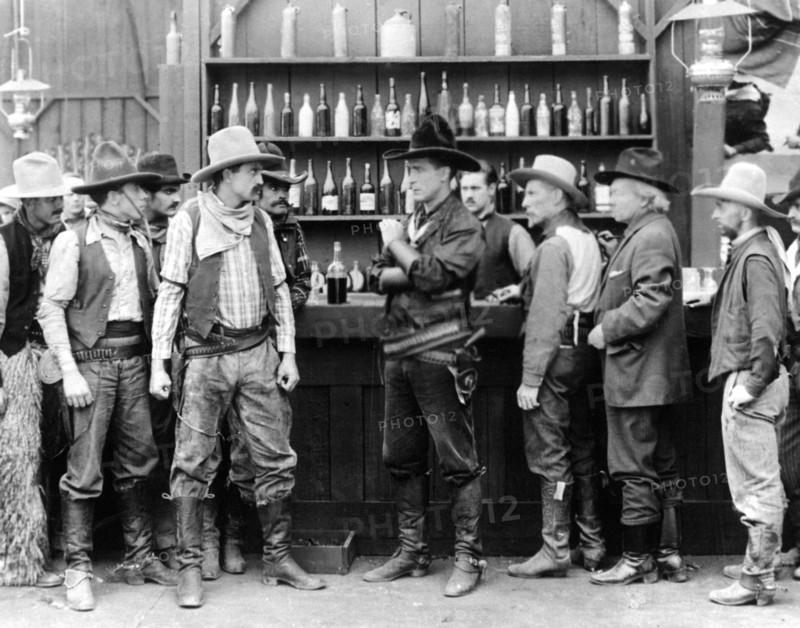 William S. Hart and Robert McKim and group of Men, on-set of the Silent Film, "Return of Draw Egan", 1916