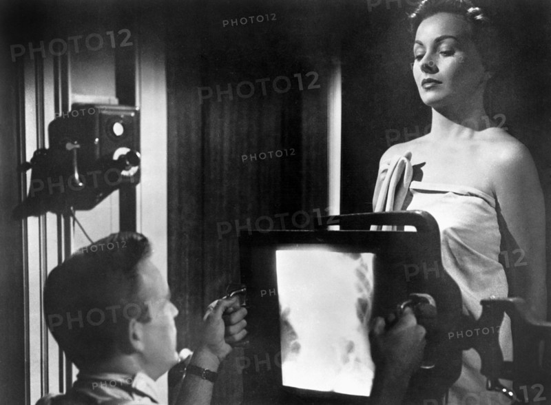 Scott Brady, Jeanne Crain, on-set of the Film, "The Model and the Marriage Broker", 1951