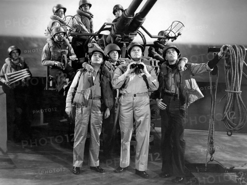 Edward G. Robinson, (left), Glenn Ford, (right), on-set of the Film, "Destroyer", 1943