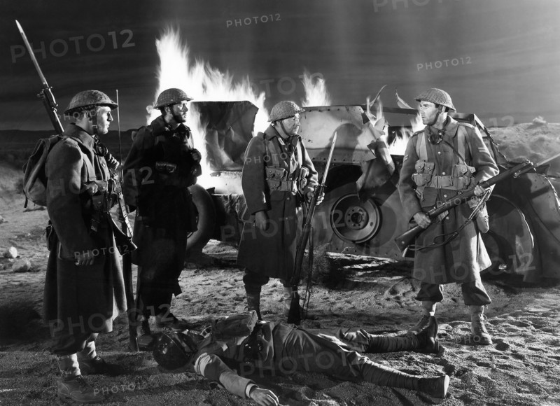 Melville Cooper, (Center), Henry Fonda, (Right), on-set of the Film, "Immortal Sergeant", 20th Century Fox, 1943