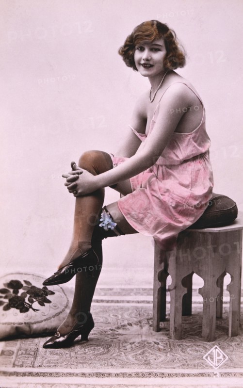 Lingerie Model Sitting on Stool, circa 1920